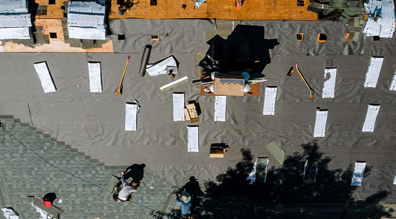 Roof Tarping: How-To, The Process, Longevity, and Safety - Roof Tarping After Snow Damage